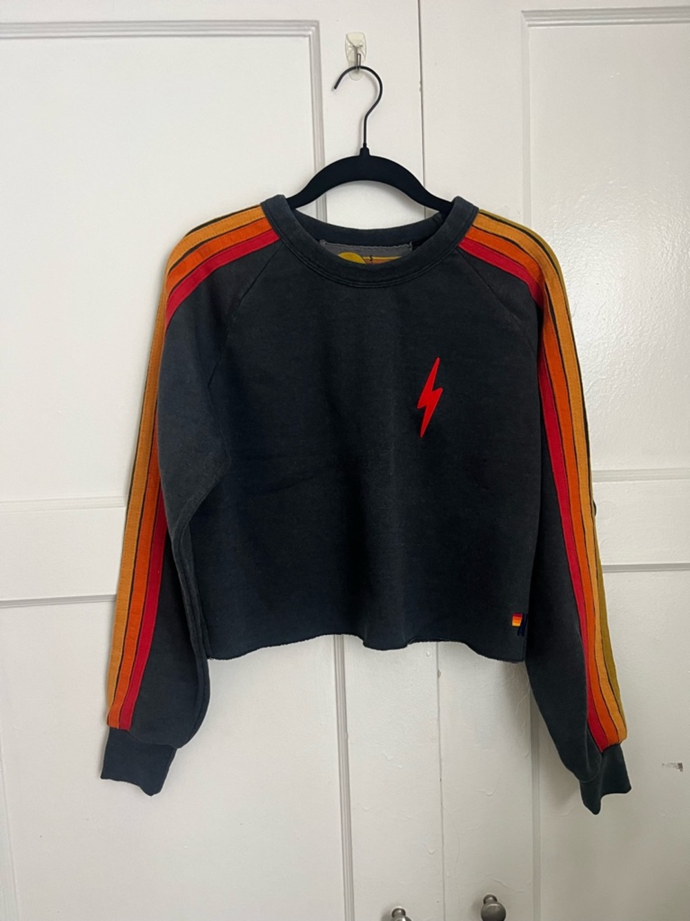 Black Cropped Sweatshirt with Red Lightning and Retro Stripe Sleeves
